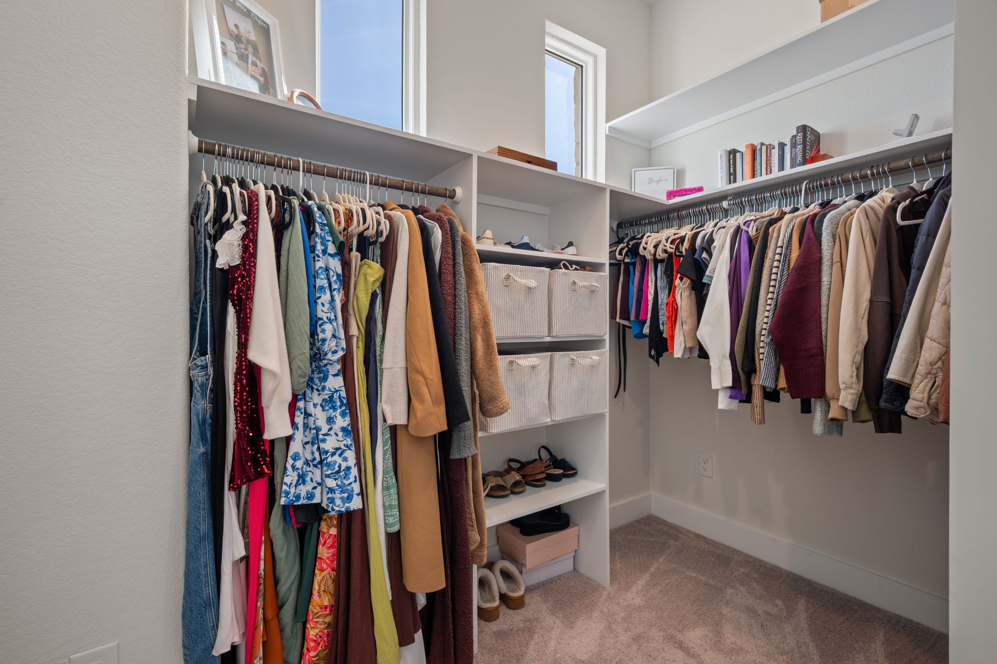 8604 Bar K Ranch Road Lago Vista, TX 78645 - Photo 19 of 37 Walk in closet featuring light carpet