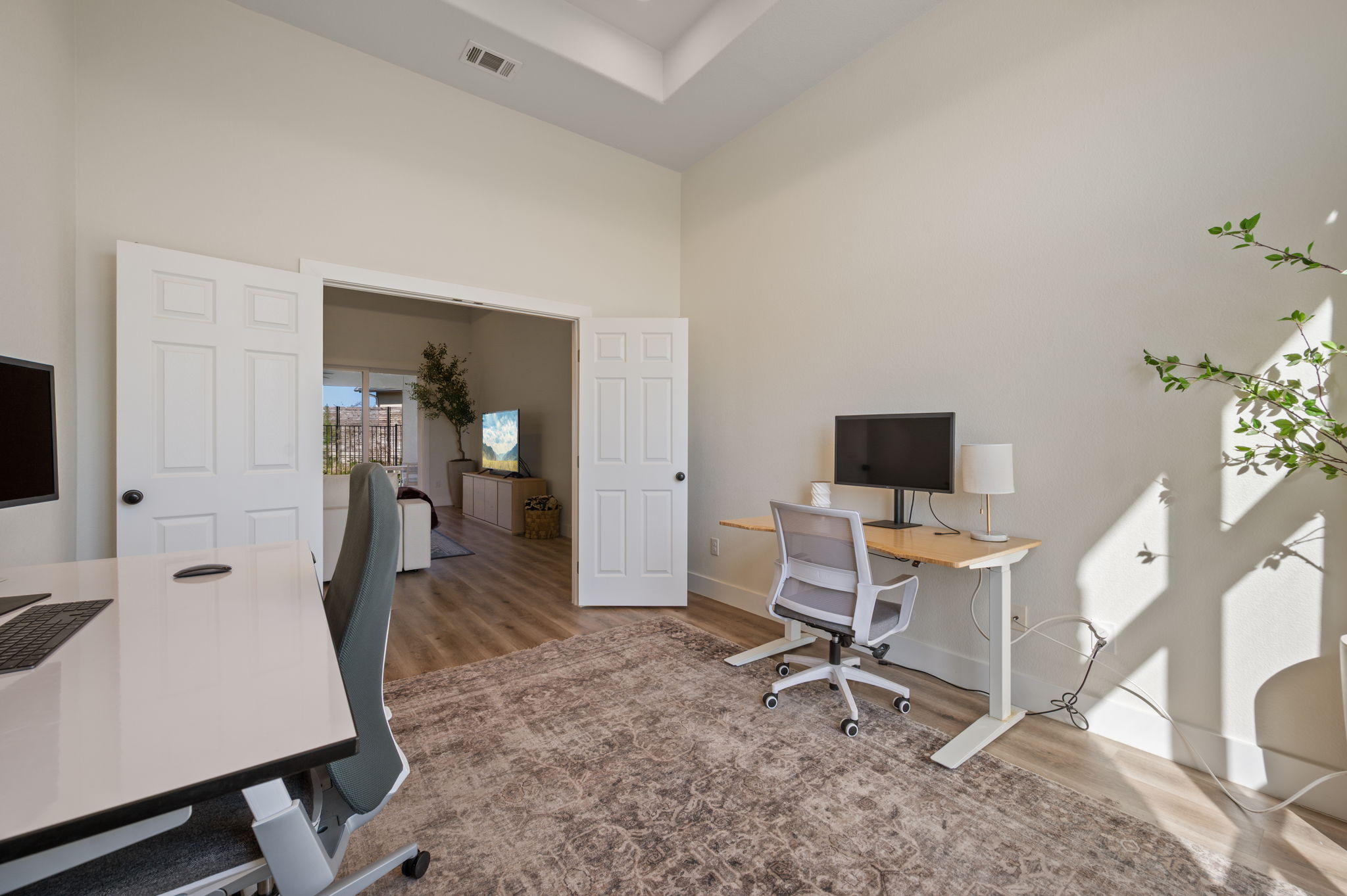 8604 Bar K Ranch Road Lago Vista, TX 78645 - Photo 21 of 37 Home office with wood finished floors and a high ceiling