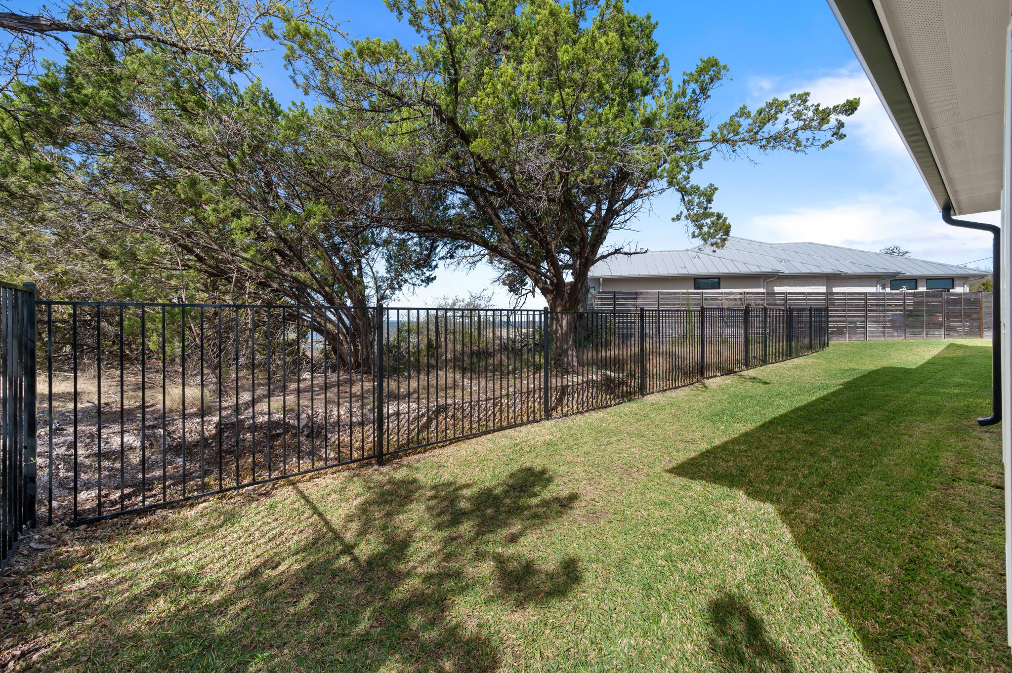 8604 Bar K Ranch Road Lago Vista, TX 78645 - Photo 32 of 37 View of fenced backyard