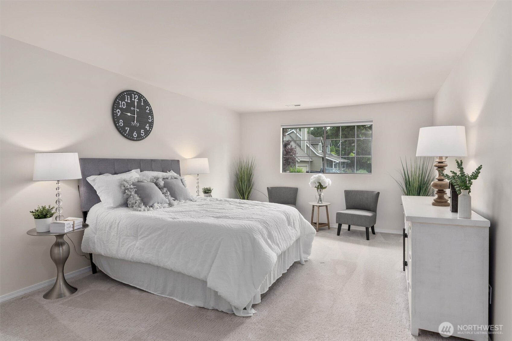 2101 233rd Street Southeast Bothell, WA 98021 - Photo 15 of 40 a bedroom with a bed and a table with chair