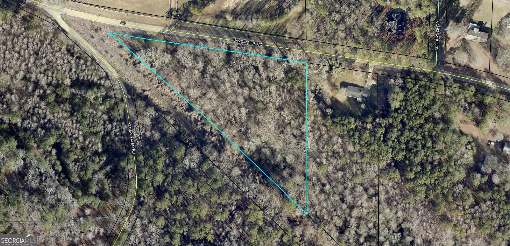 4038 West McIntosh Road Griffin, GA 30223 - Photo 1 of 6 a view of a dry yard