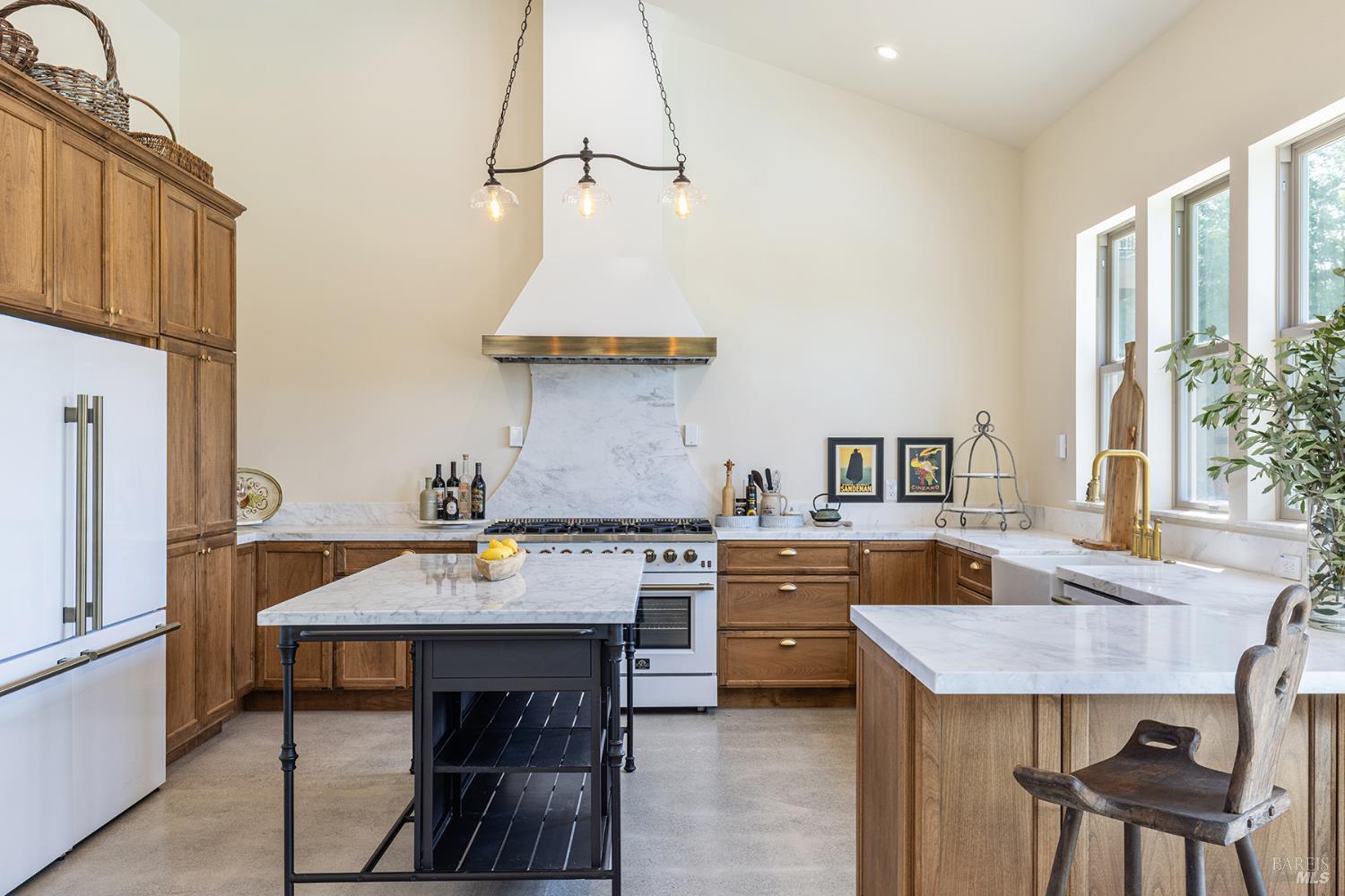 753 Sunnyside Road St. Helena, CA 94574 - Photo 8 of 55 a kitchen with a stove a table and chairs in it