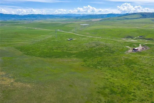 a view of a golf course with a lake
