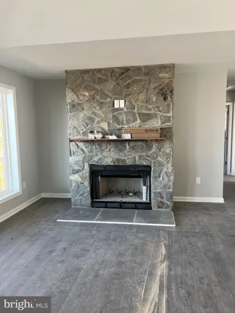 a living room with a fireplace