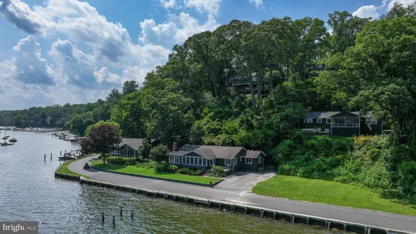 a view of lake with green space