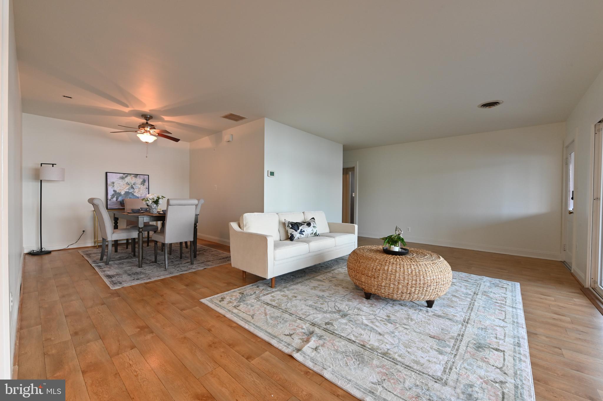 769 Robin Hood Road Annapolis, MD 21405 - Photo 13 of 79 a living room with furniture and a table