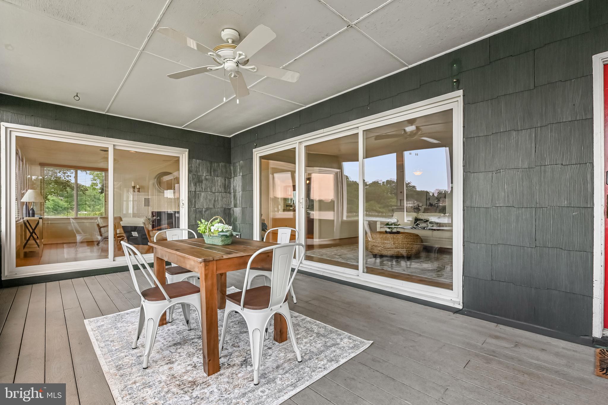 769 Robin Hood Road Annapolis, MD 21405 - Photo 20 of 79 a view of a dining room with furniture wooden floor and chandelier