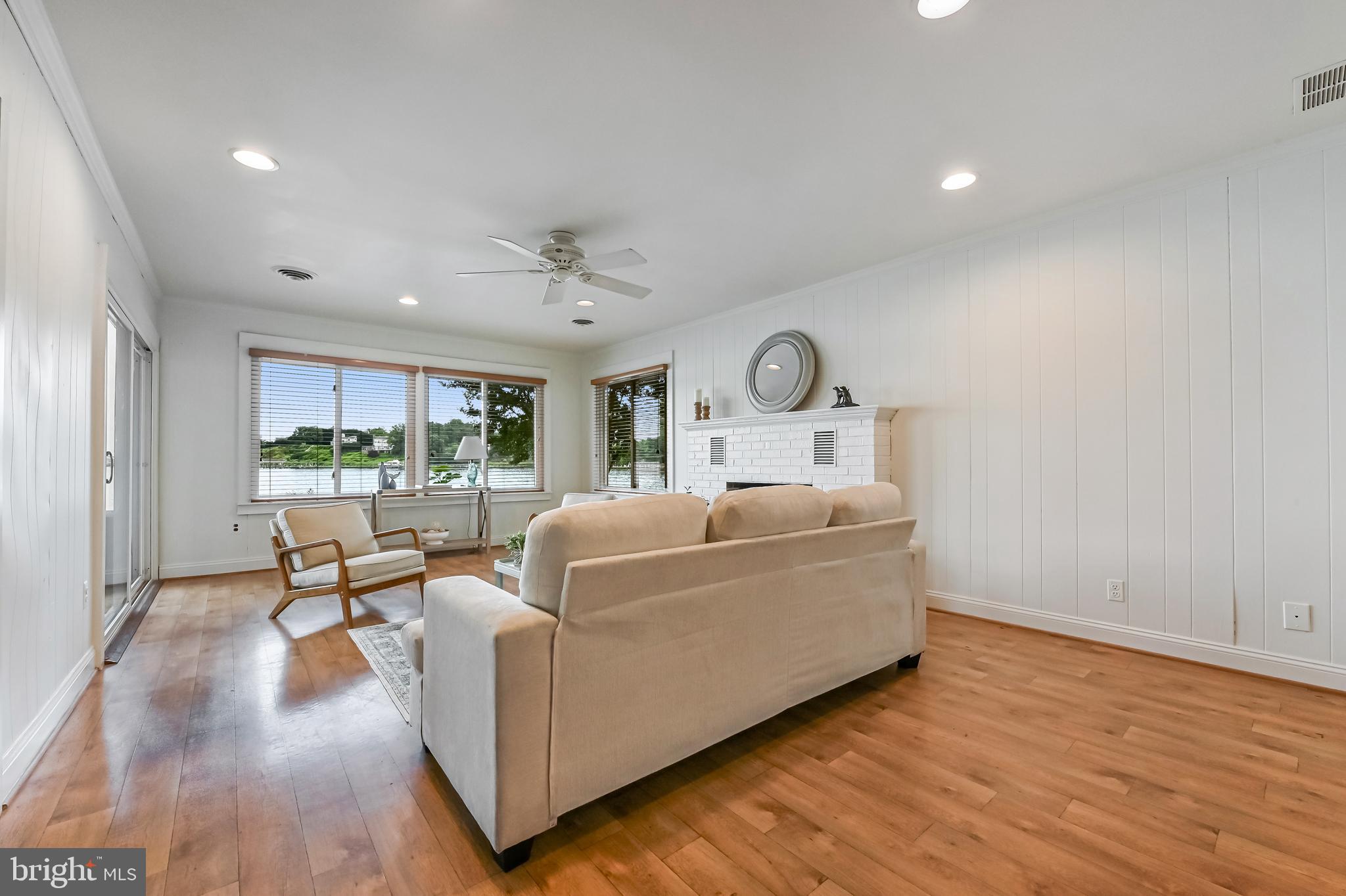 769 Robin Hood Road Annapolis, MD 21405 - Photo 21 of 79 a living room with furniture and a large window