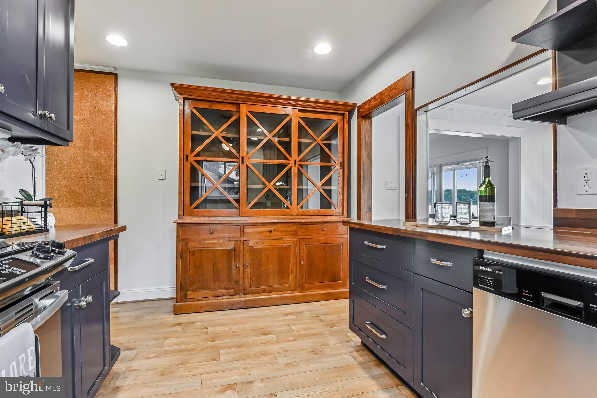 769 Robin Hood Road Annapolis, MD 21405 - Photo 32 of 79 a kitchen with stainless steel appliances granite countertop a stove and a sink
