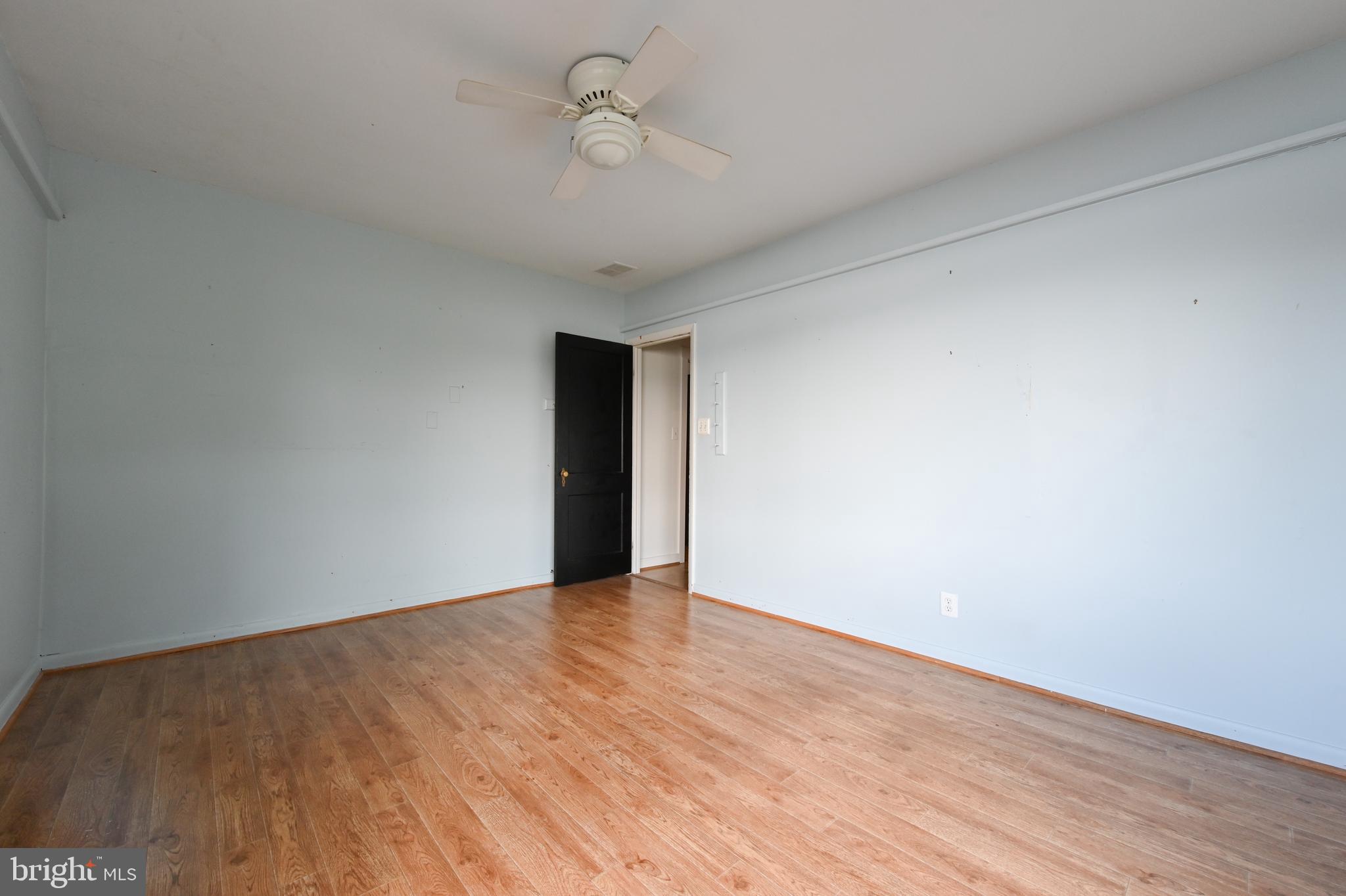 769 Robin Hood Road Annapolis, MD 21405 - Photo 35 of 79 a view of an empty room with wooden floor