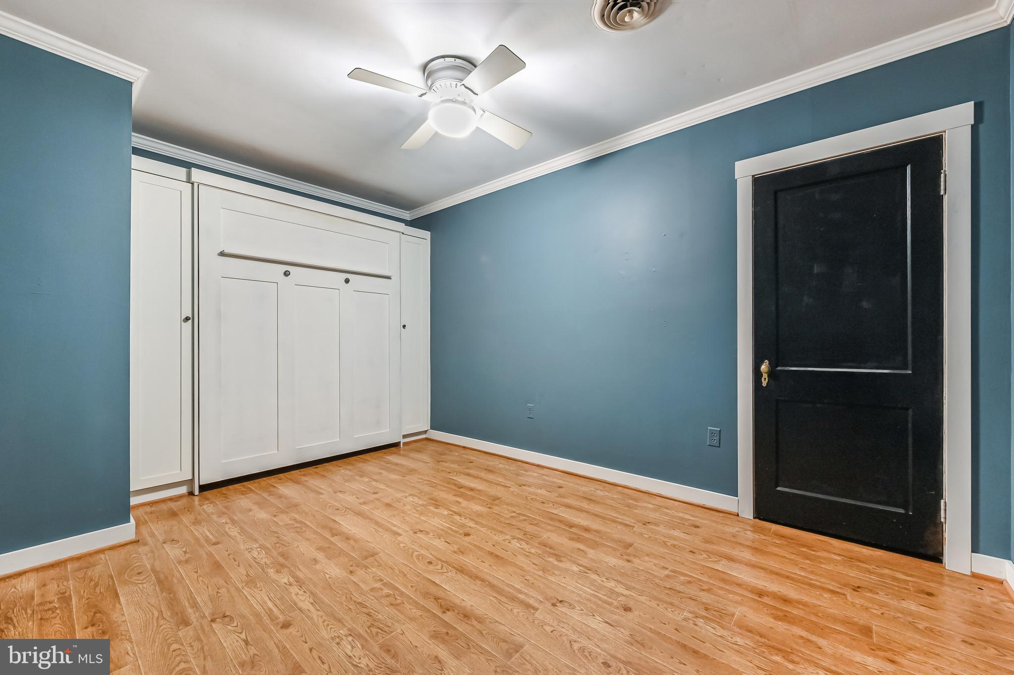 769 Robin Hood Road Annapolis, MD 21405 - Photo 46 of 79 a view of empty room with wooden floor