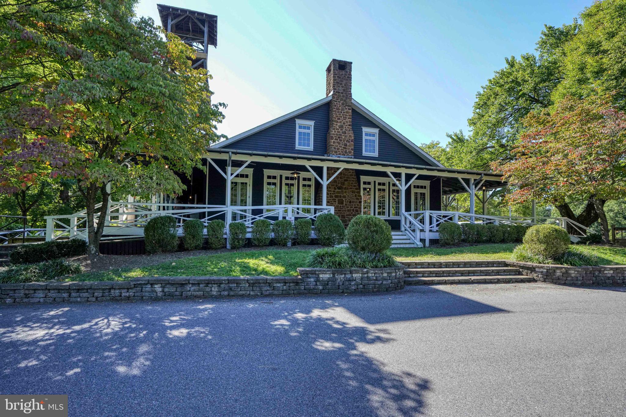 769 Robin Hood Road Annapolis, MD 21405 - Photo 54 of 79 a front view of a house with a yard and outdoor seating