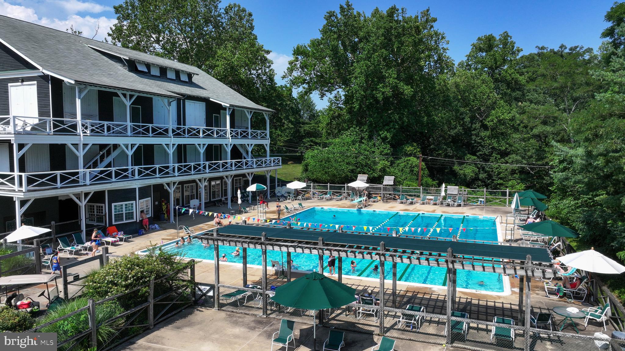 769 Robin Hood Road Annapolis, MD 21405 - Photo 71 of 79 a view of a patio with table and chairs and potted plants