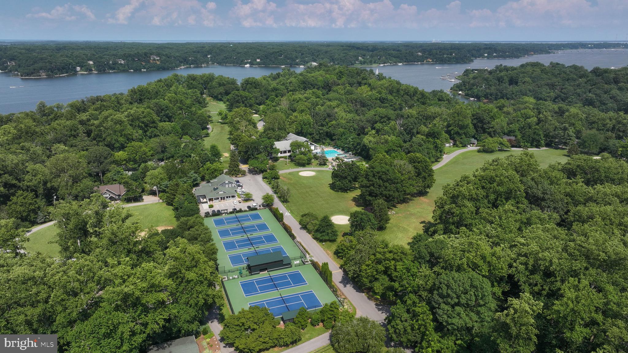 769 Robin Hood Road Annapolis, MD 21405 - Photo 73 of 79 a view of a lake with a yard