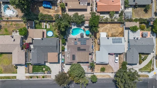 an aerial view of a city with lots of residential buildings