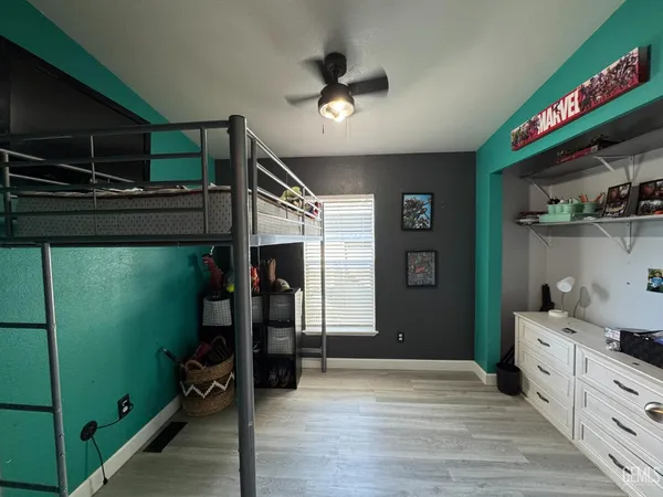a view of a hallway with workspace and entryway