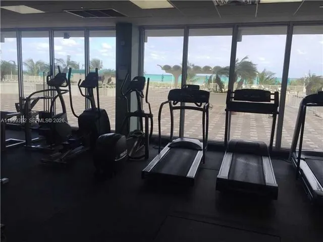 a view of gallery with wooden floor