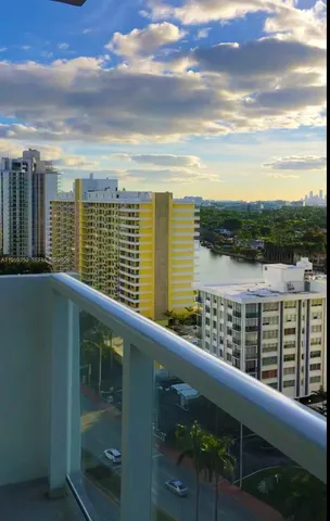 a view of a lake from a balcony