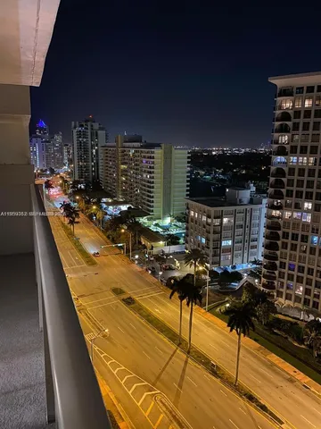 a view of a city with tall buildings