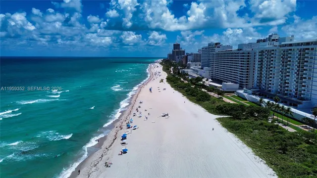 a view of a building with a yard