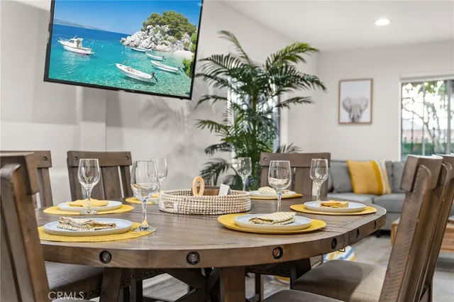 a kitchen with a sink a stove and cabinets