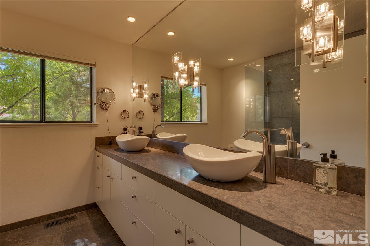 12935 Roseview Lane Reno, NV 89511 - Photo 13 of 17 a bathroom with double vanity sink and a mirror