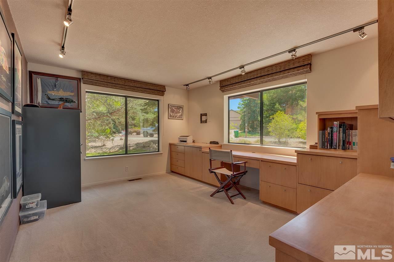 12935 Roseview Lane Reno, NV 89511 - Photo 10 of 17 a livingroom with workspace and a window