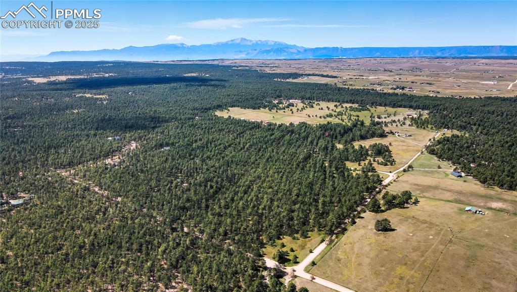18380 Black Squirrel Road Colorado Springs, CO 80908 - Photo 6 of 10 a view of lake with mountain