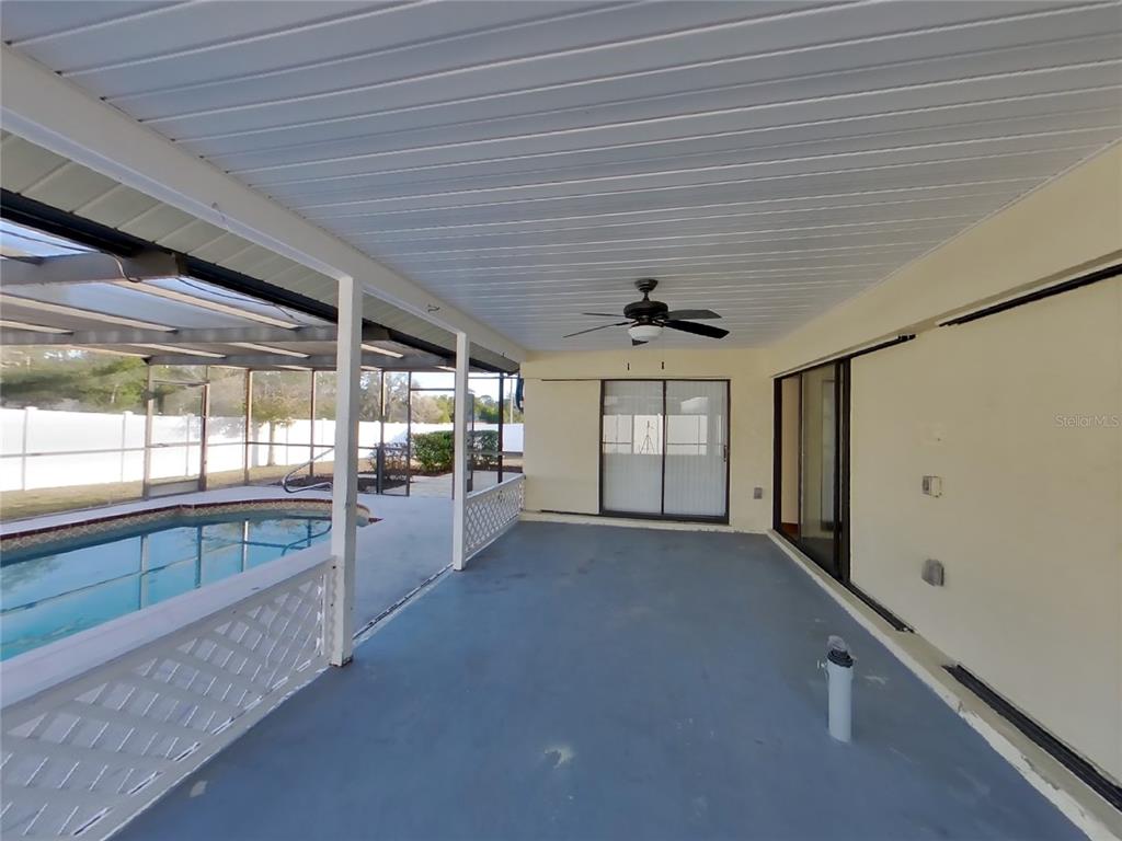 Undisclosed Address Spring Hill, FL 34608 - Photo 14 of 16 a view of an empty room with a window