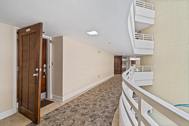 a kitchen with a sink and a refrigerator