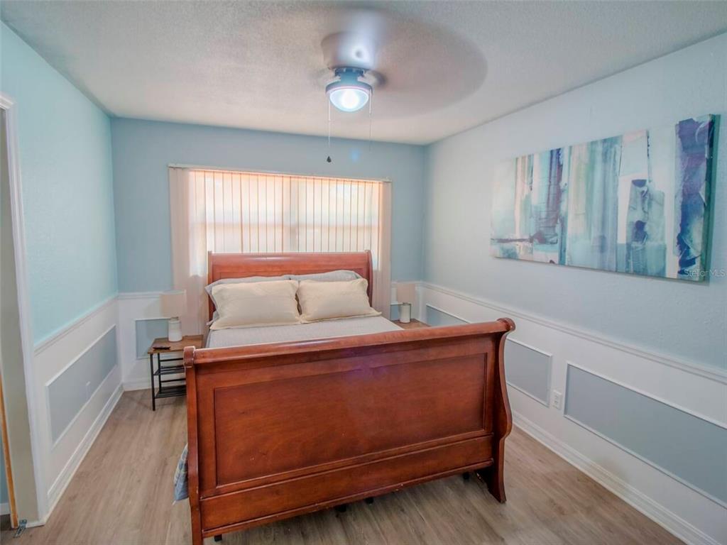 Undisclosed Address Orlando, FL 32812 - Photo 12 of 26 a bed room with a bed and a window