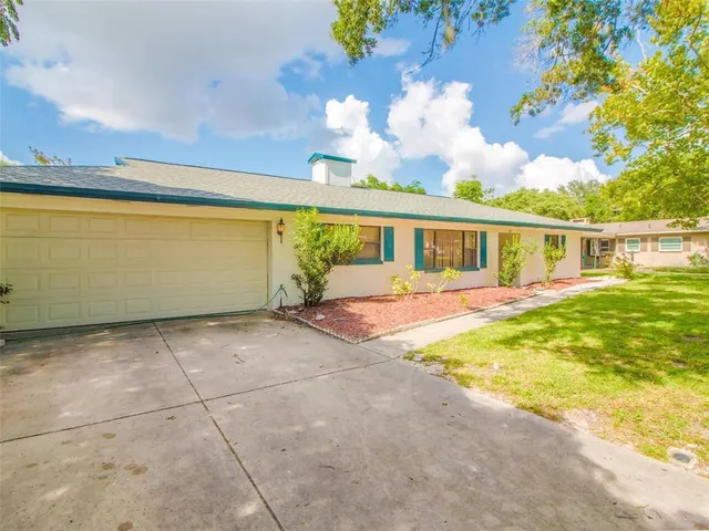 a view of a house with swimming pool
