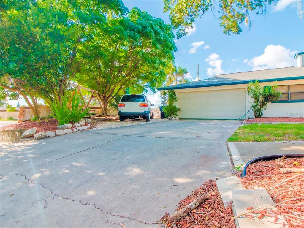 Undisclosed Address Orlando, FL 32812 - Photo 25 of 26 a view of a back yard of the house