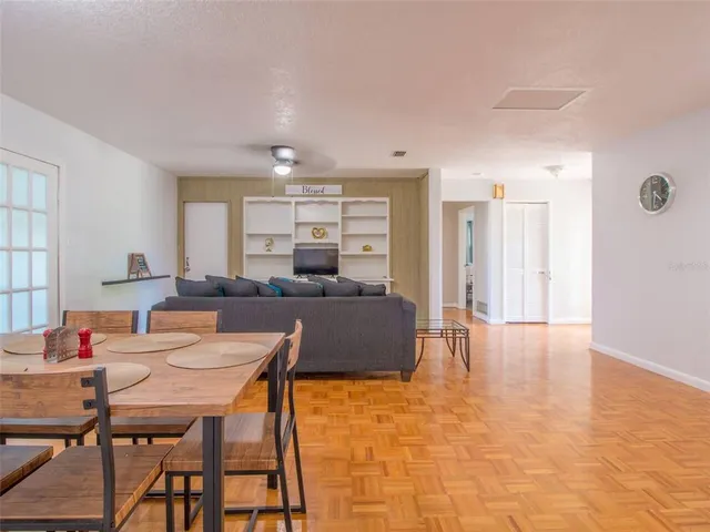 a view of a dining room with furniture
