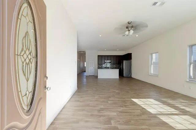 a view of livingroom with kitchen