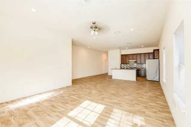 a view of kitchen with wooden floor