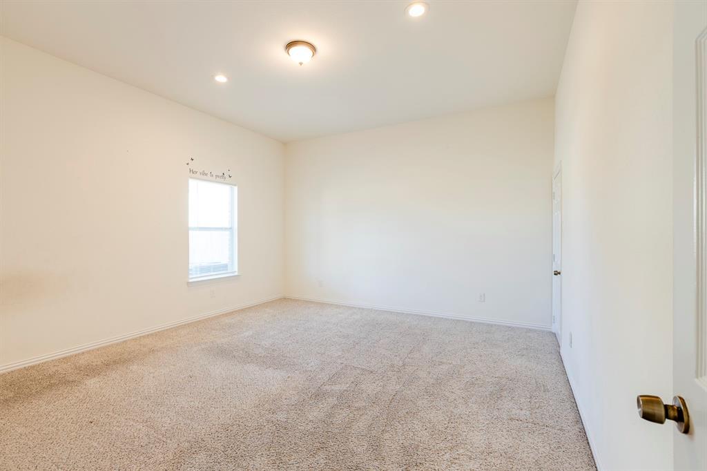 14247 Greenhaw Lane Dallas, TX 75253 - Photo 37 of 39 an empty room with a window