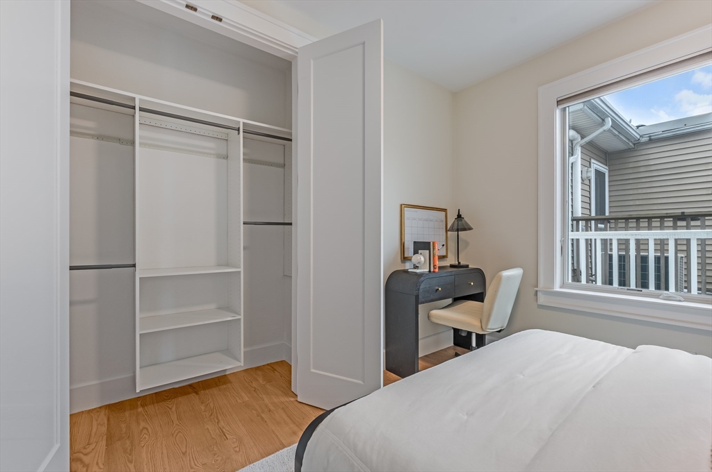 17 Vinton Street, Unit 3 Boston, MA 02127 - Photo 17 of 21 a bedroom with a bed and a window