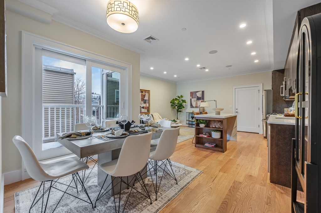17 Vinton Street, Unit 3 Boston, MA 02127 - Photo 7 of 21 a view of a dining room with furniture window and outside view
