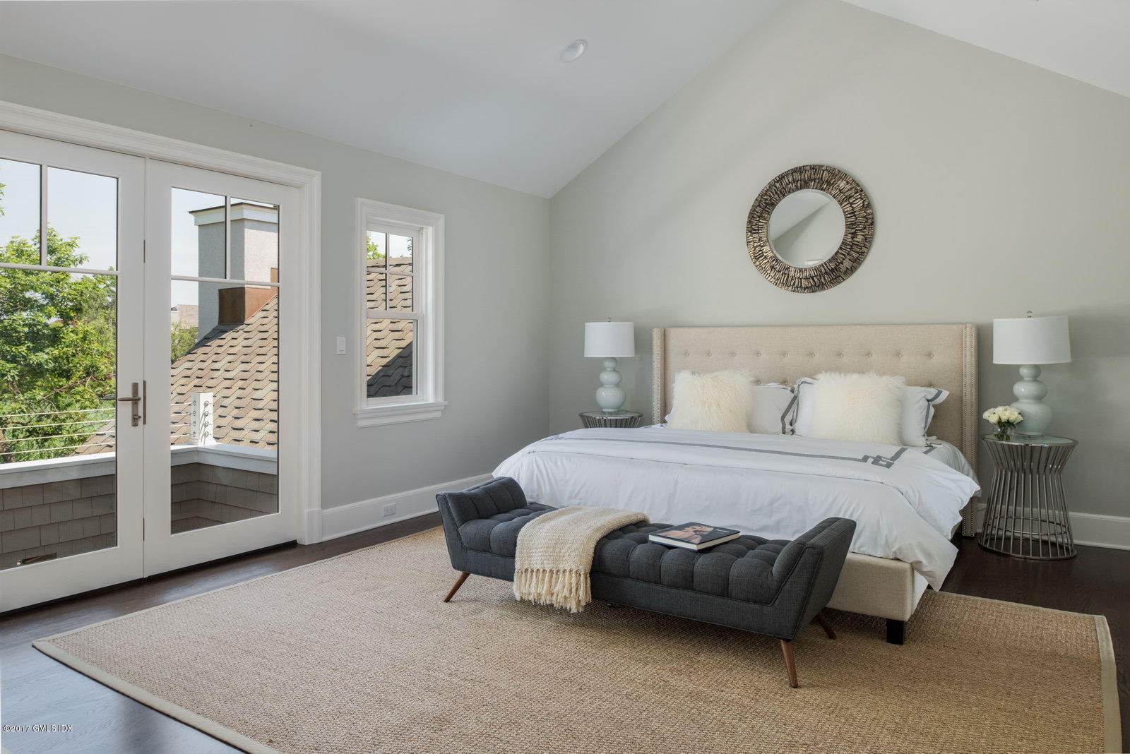 12 Ballwood Road Old Greenwich, CT 06870 - Photo 11 of 25 a bedroom with a bed and wooden floor