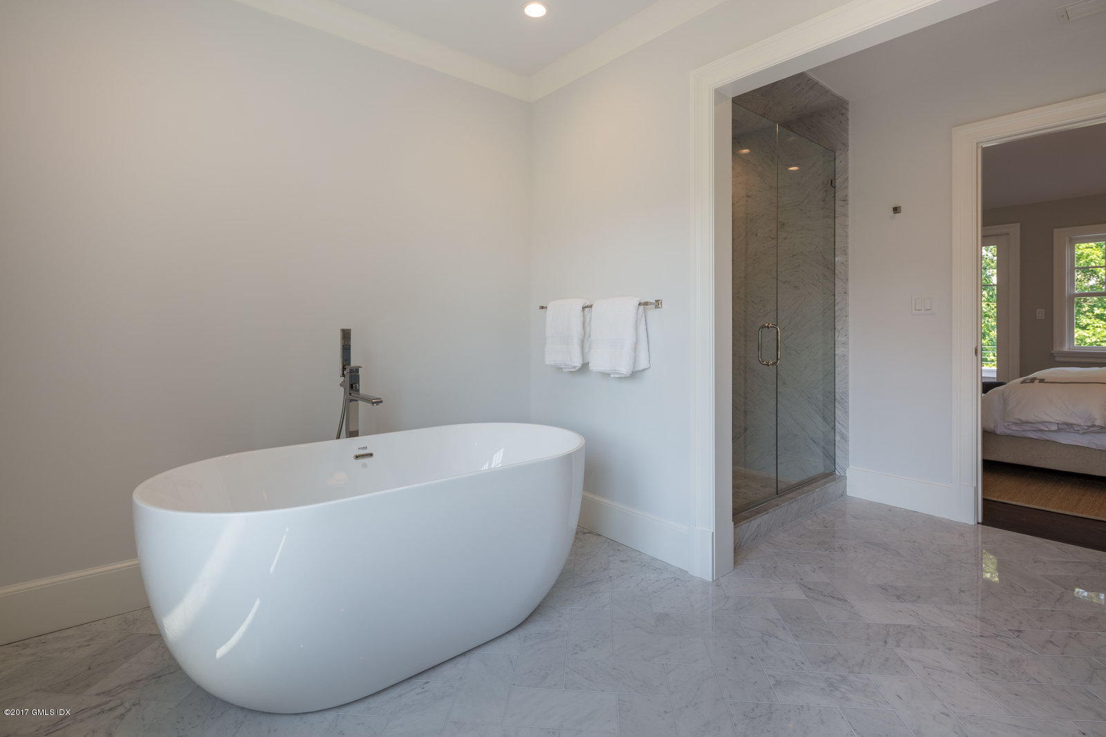 12 Ballwood Road Old Greenwich, CT 06870 - Photo 13 of 25 a white bath tub sitting in a bathroom