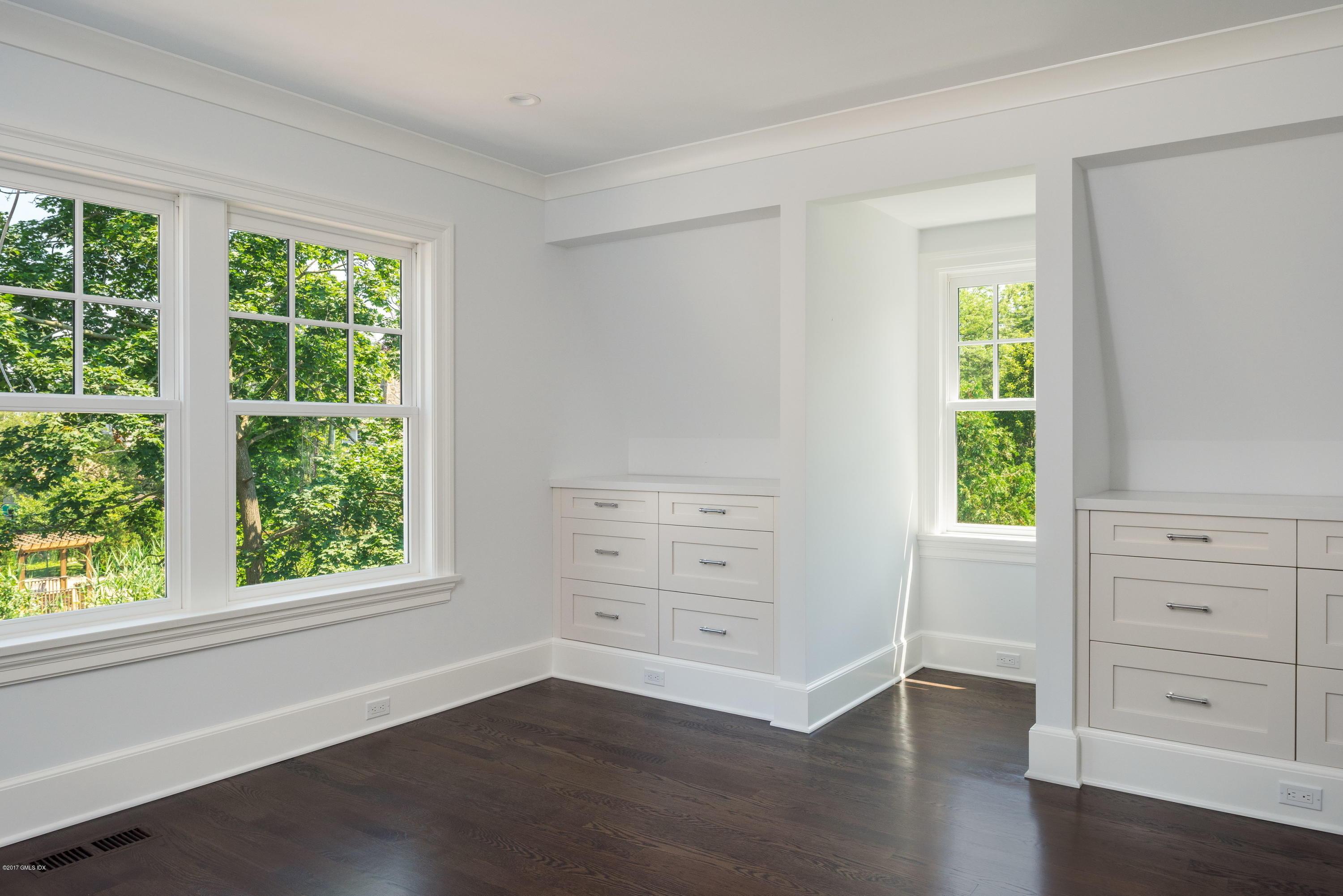 12 Ballwood Road Old Greenwich, CT 06870 - Photo 14 of 25 wooden floor in an empty room with a window