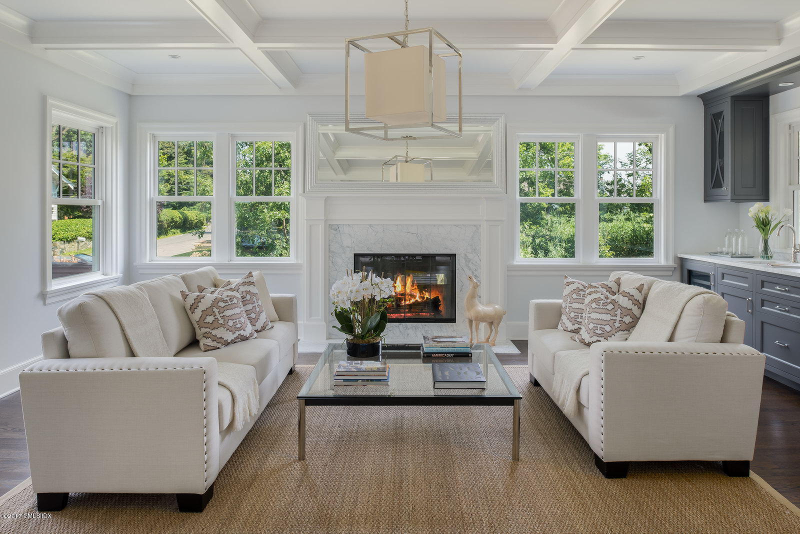 12 Ballwood Road Old Greenwich, CT 06870 - Photo 2 of 25 a living room with furniture and a fireplace