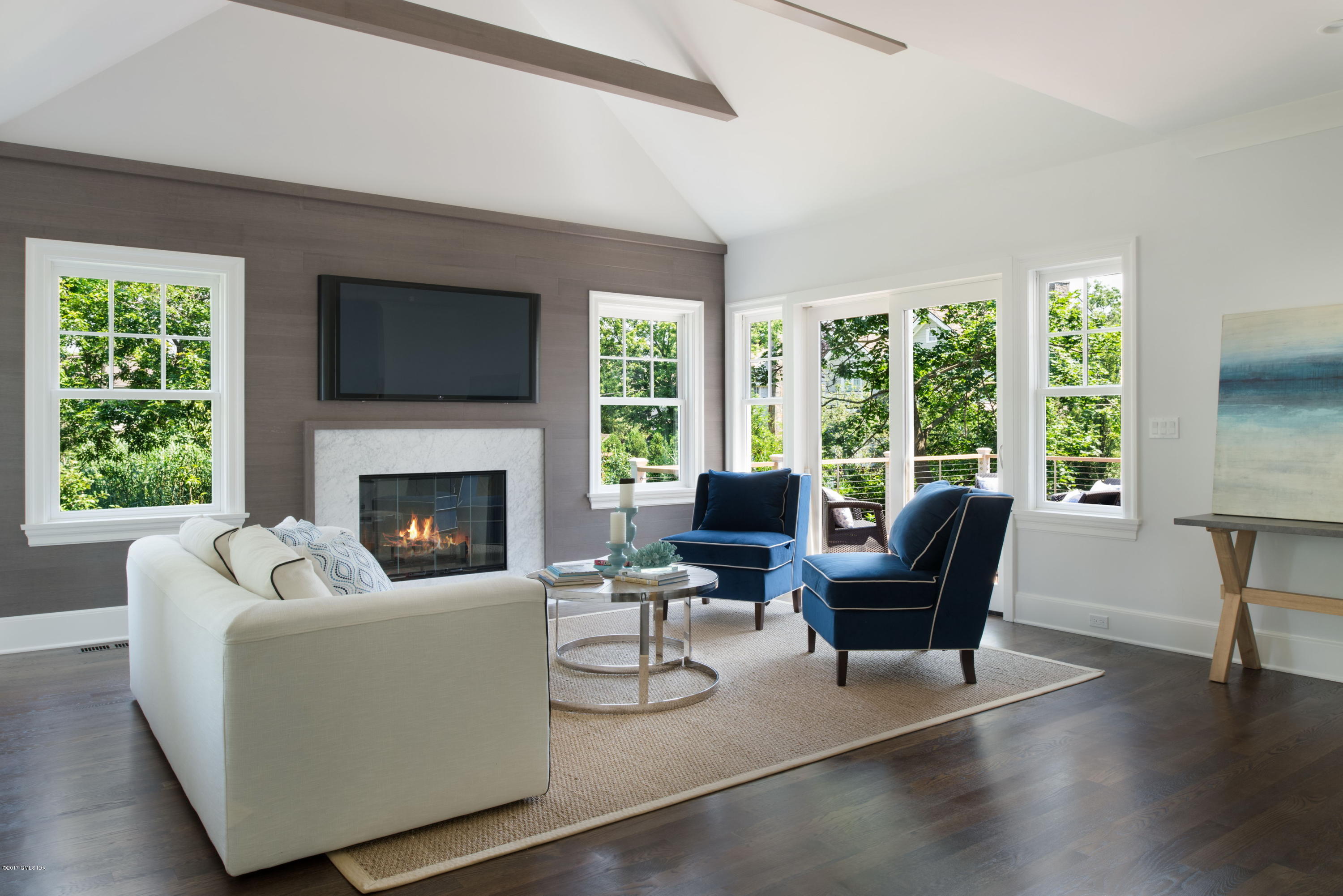 12 Ballwood Road Old Greenwich, CT 06870 - Photo 8 of 25 a living room with furniture and a fireplace