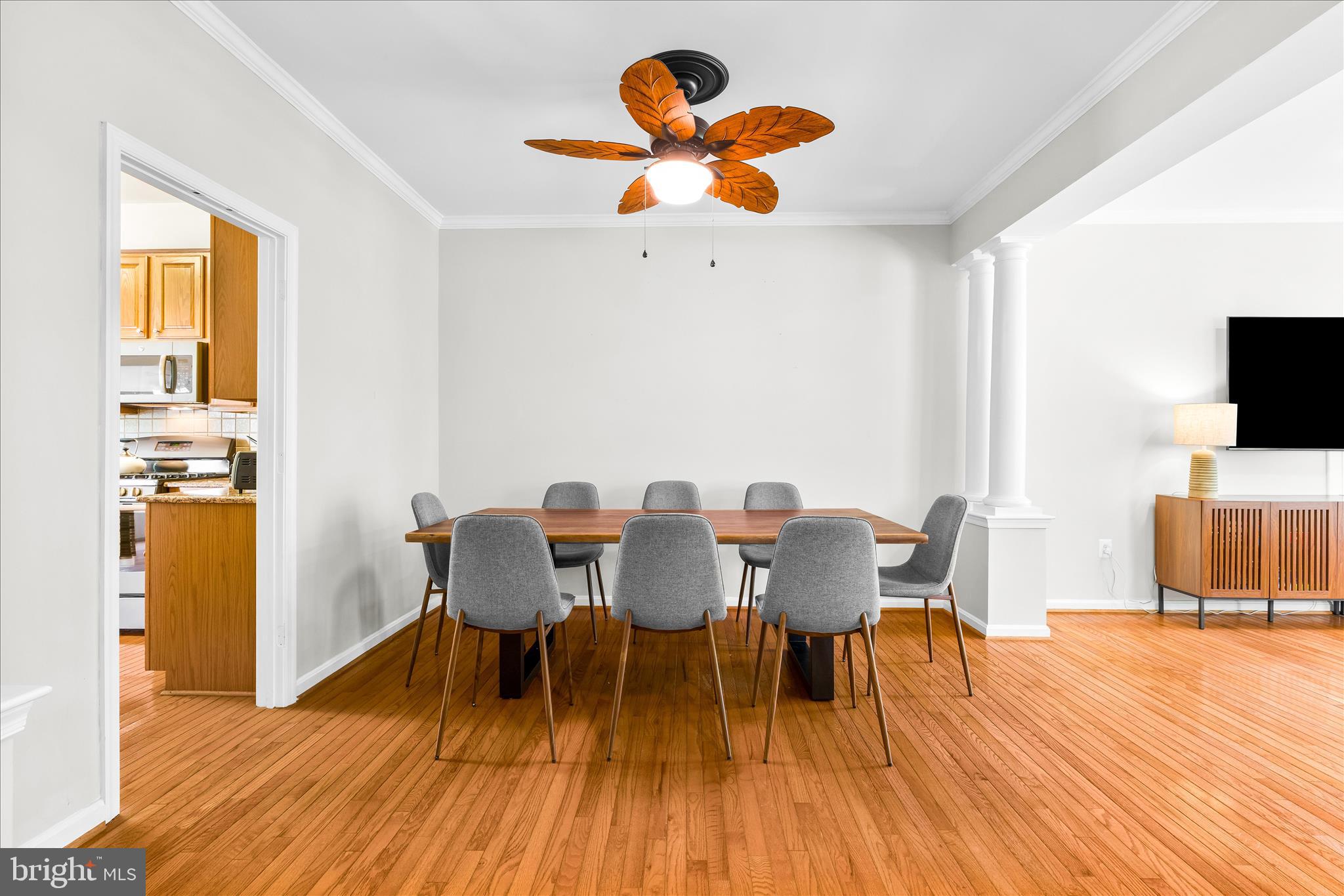 2442 Rippling Brook Road Frederick, MD 21701 - Photo 12 of 85 a dining room with furniture and wooden floor
