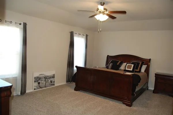 a bathroom with a sink vanity and a mirror