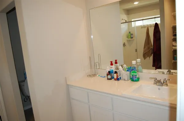 a view of a hallway with a closet