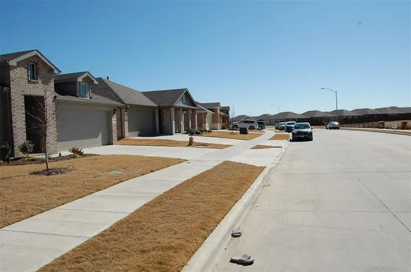 a view of a terrace with yard