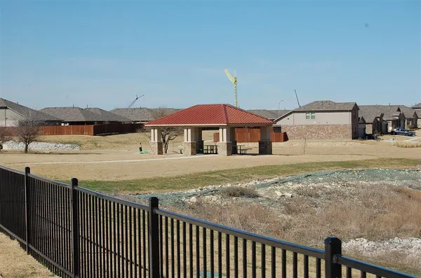 a view of yard from deck patio and outdoor seating