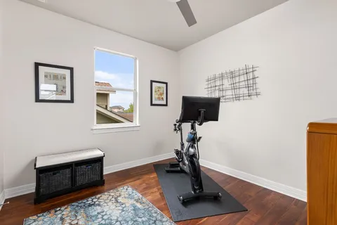 a room with a bed and a television in it